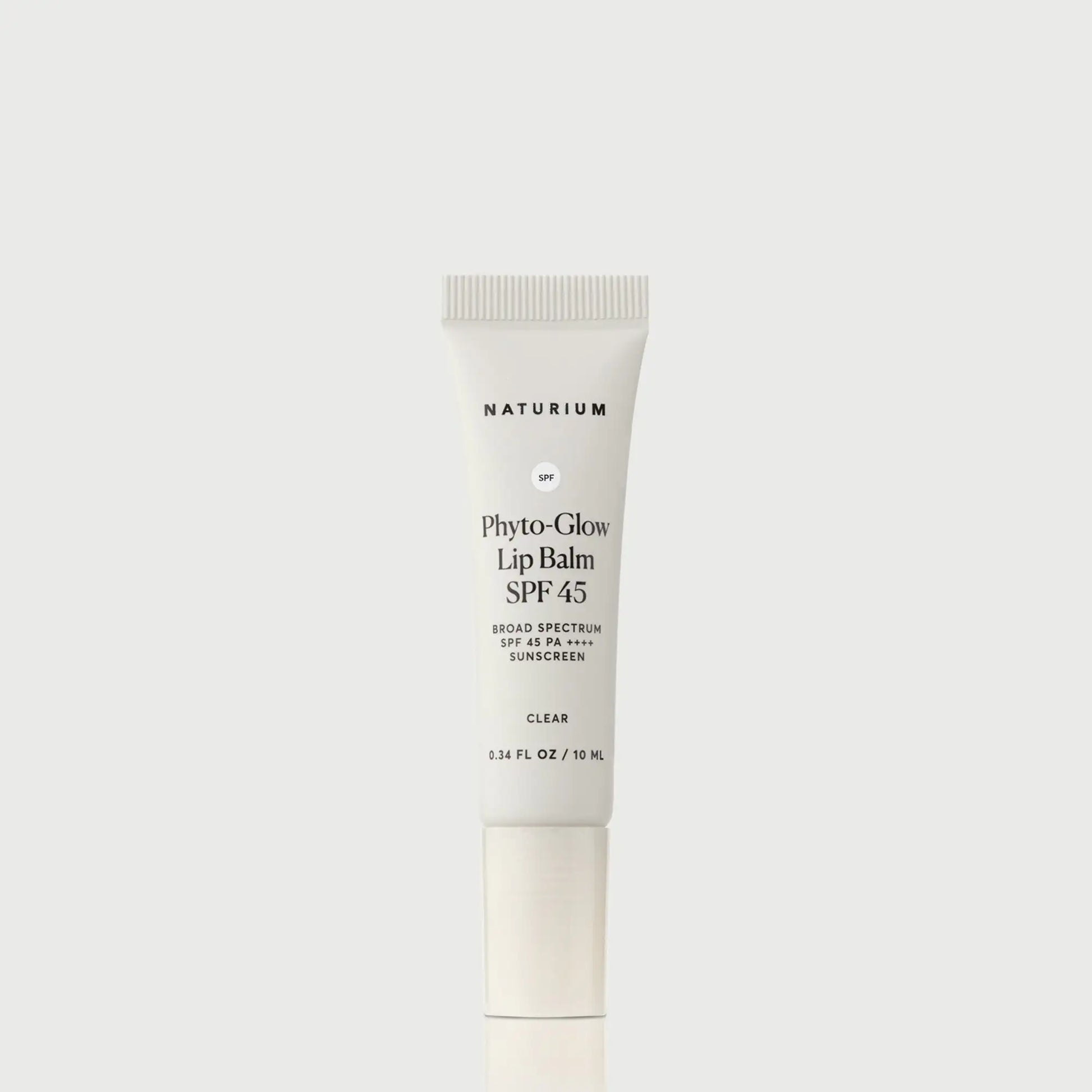 phyto-glow-lip-balm-spf-45-clear-i1 NATR-10124_PhytoGlow_SPF_Clear_primary_capon_front_bonebkgd_1.webp