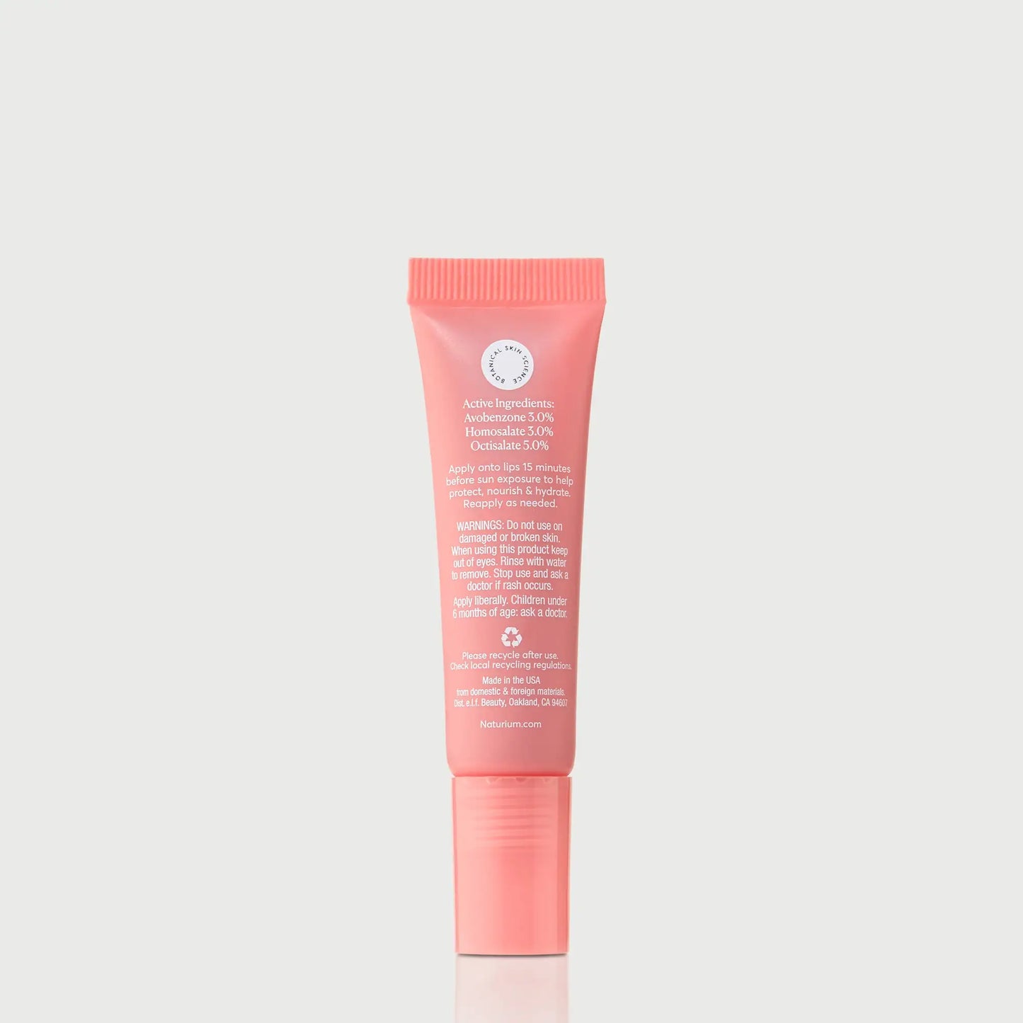 phyto-glow-lip-balm-spf-45-paradise-z8 NATR-10127_PhytoGlow_SPF_Paradise_primary_capon_back_bonebkgd_1.webp