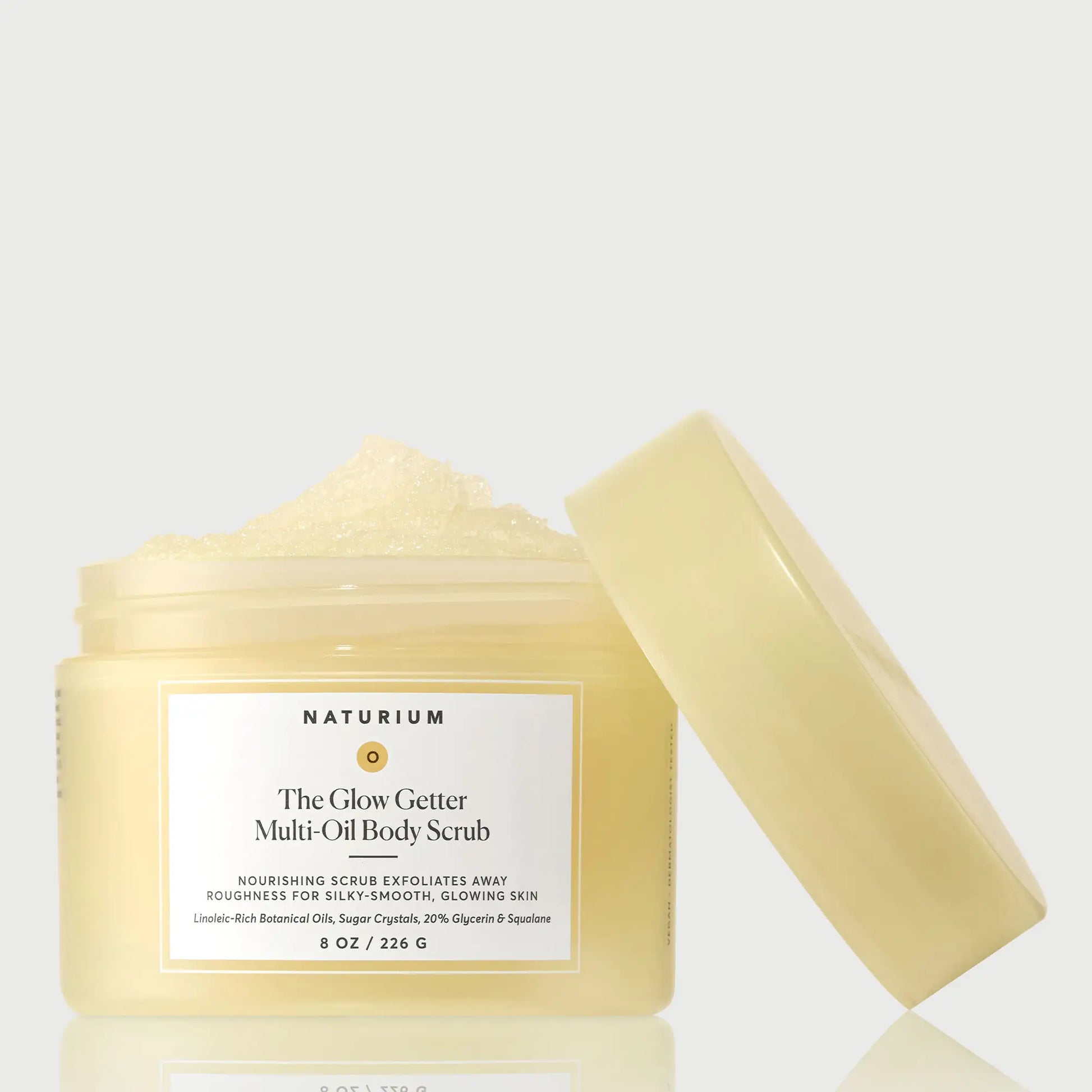 the-glow-getter-multi-oil-body-scrub-h2 NATR-40028-GlowGetter-Multi-Oil-Body-Scrub-Front-CapOff-bonebkgd.webp