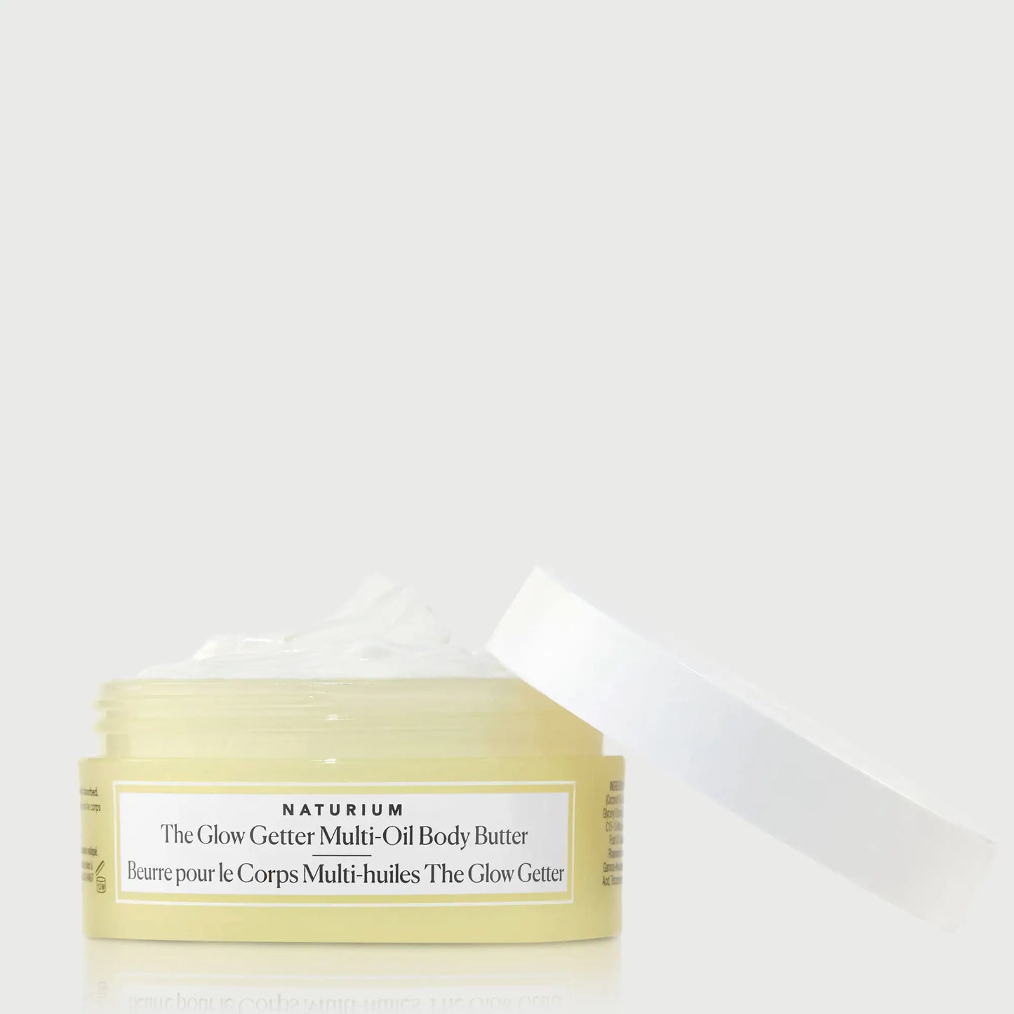 the-glow-getter-multi-oil-body-butter-travel-size-f8 NATR-40115_Glow-Getter-Body-Butter-Mini_front_capoff_bonebkgd.webp