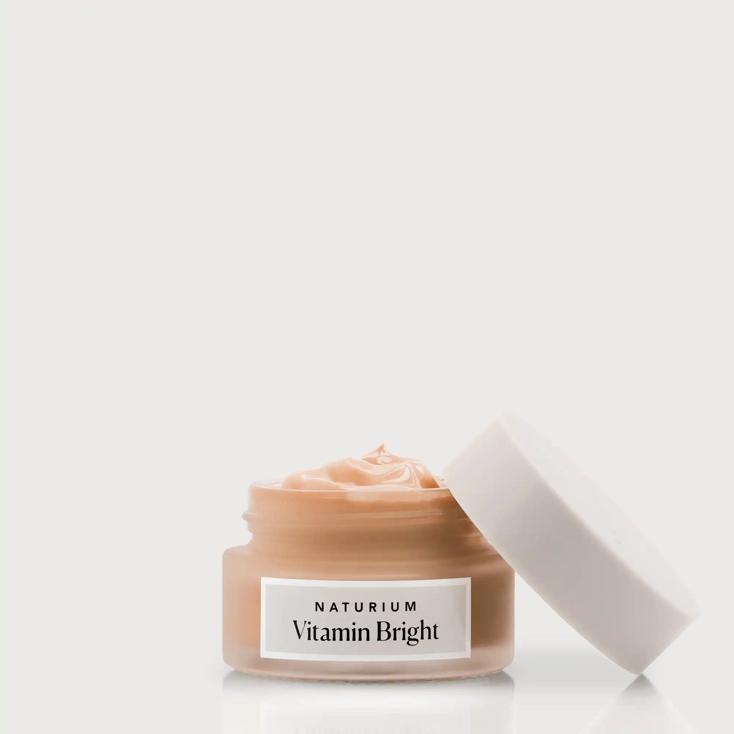 vitamin-bright-illuminating-eye-cream-q0 NATR-VitaminBright_DEEP_Primary_front_openjar_bone.webp