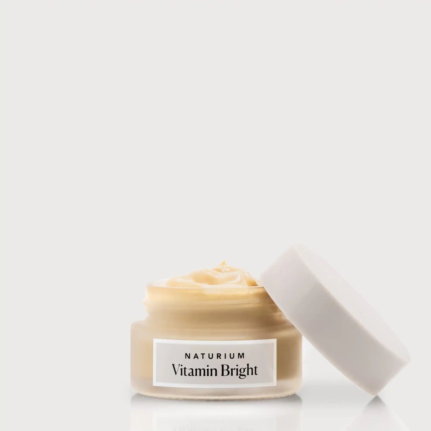 vitamin-bright-illuminating-eye-cream-q0 NATR-VitaminBright_LIGHT_Primary_front_openjar_bone.webp