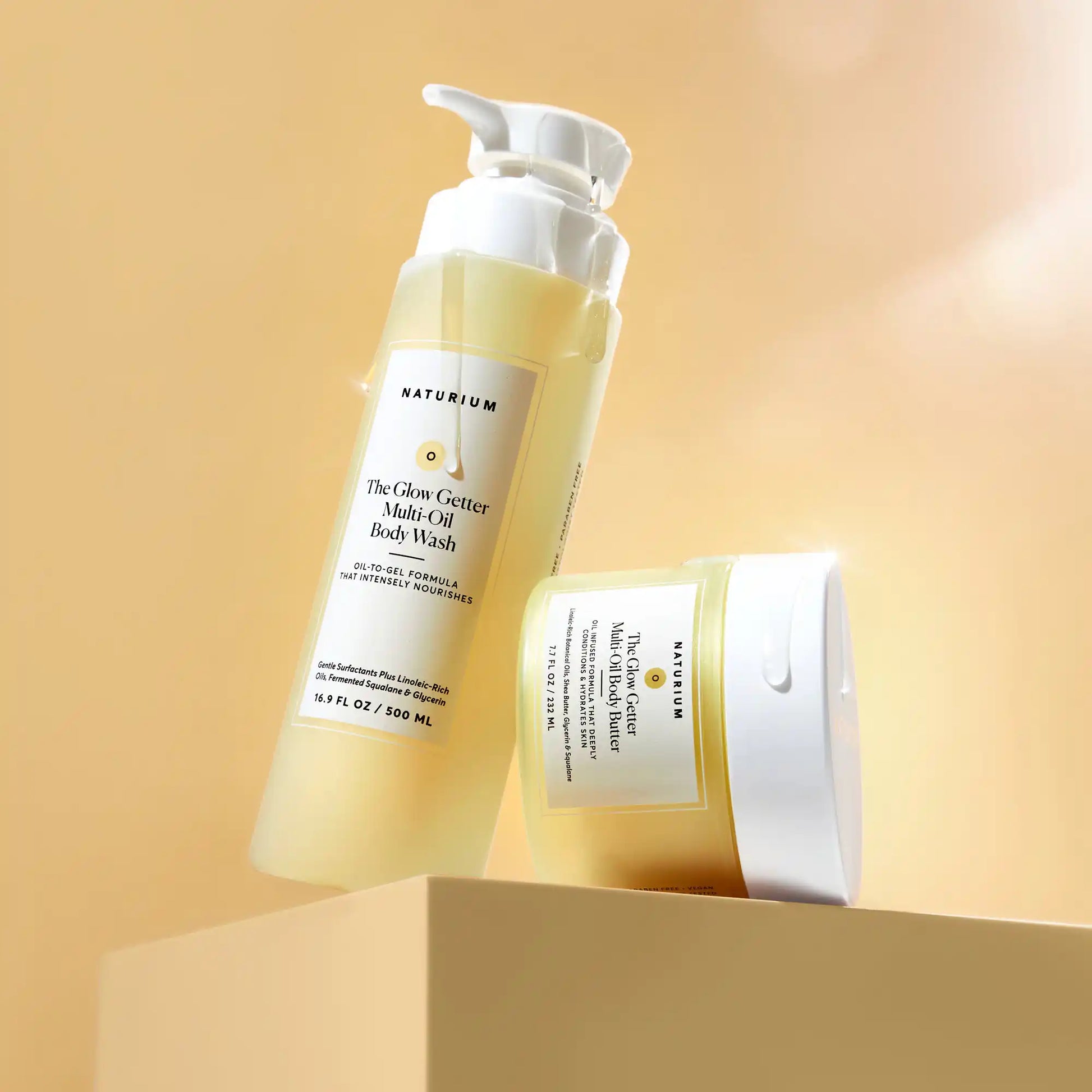 the-glow-all-out-body-bundle-r8 gg-bodybutter_1464-crop_revcolor_FL.webp
